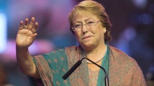 Presidential candidate Michelle Bachelet waves at her closing campaign rally in Santiago, Chile, Thursday, Nov. 14, 2013. Bachelet is expected to overwhelmingly win Sunday's presidential election and possibly avoid a runoff. Thursday was the last day of campaigning for elections that will also choose 120 members of the lower House of Congress and 20 out of 38 Senate seats. (AP Photo/Victor Caivano)